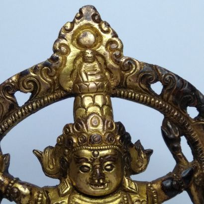 TIBET, 20th century 
Three gilded bronze...