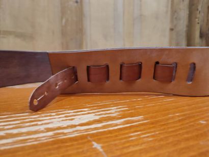 Leather belt with floral decoration and 
