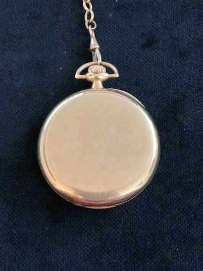 Pocket watch in yellow gold, metal chain
Gross...