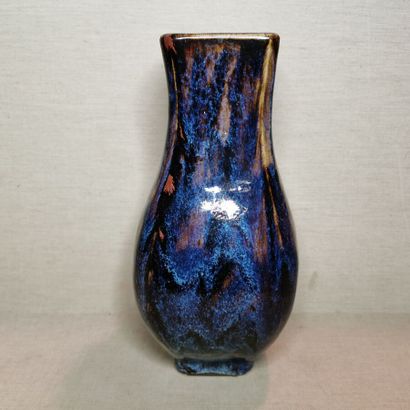 CHINA
Three hu vases in cracked and flamed...