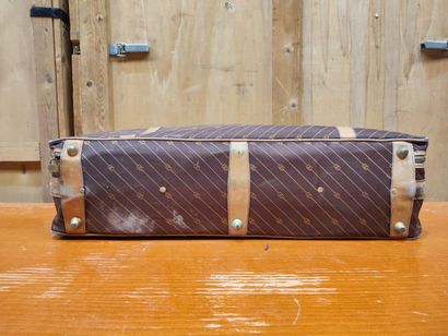 GUCCI
Set of two suitcases in monogrammed...