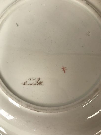 Three ceramic plates decorated with tennis...