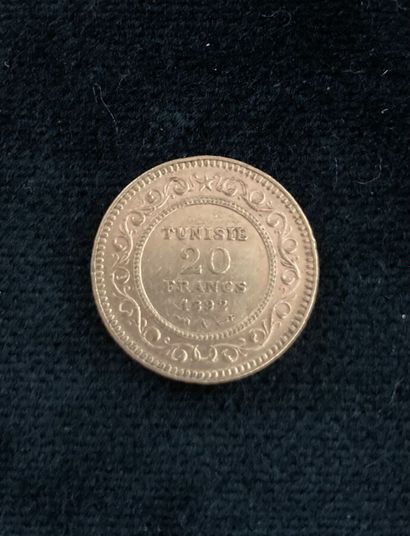 A 20-dinar Arabic gold coin, worn and rubbed

Lot...