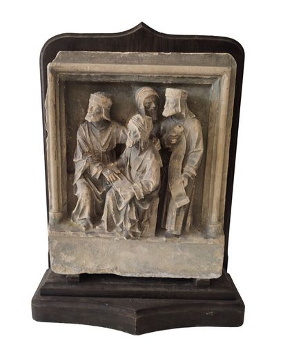 High-relief limestone altarpiece depicting...