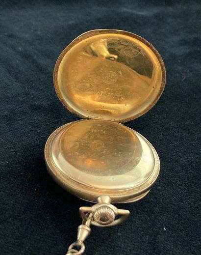 Pocket watch in yellow gold, metal chain
Gross...
