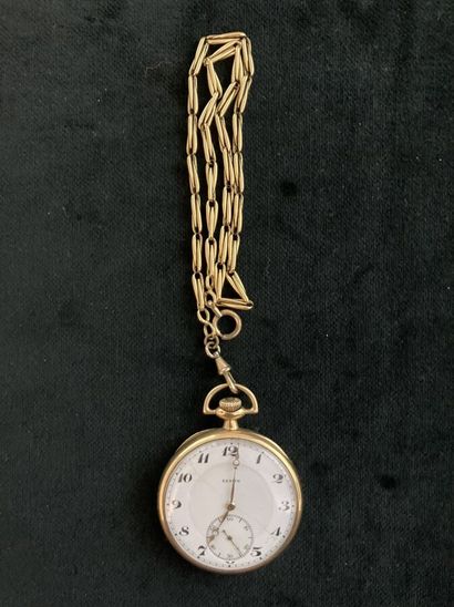 Pocket watch in yellow gold, metal chain
Gross...