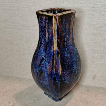 CHINA
Three hu vases in cracked and flamed...