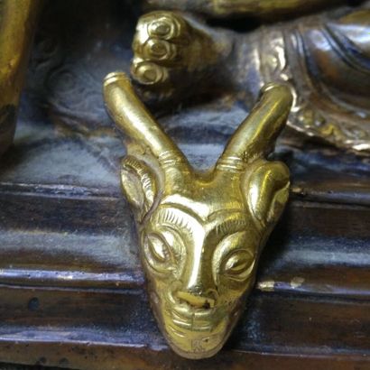 TIBET, 20th century 
Three gilded bronze...