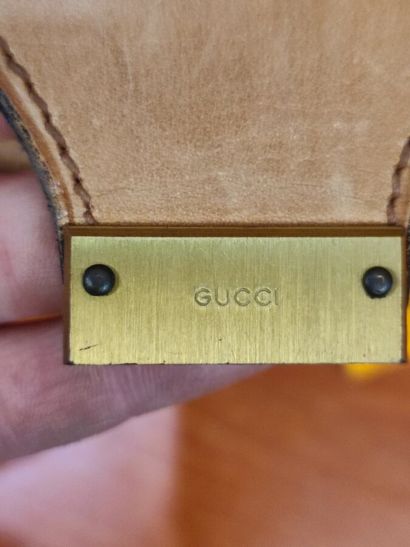 GUCCI
Set of two suitcases in monogrammed...
