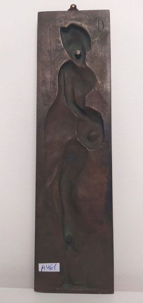 Bronze bas-relief of a woman with a jug
Signed...