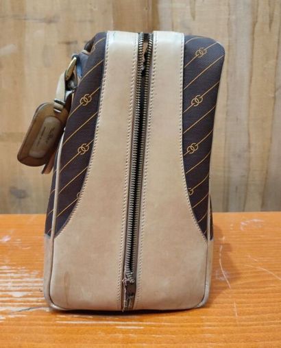 GUCCI
Set of two suitcases in monogrammed...