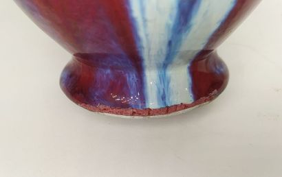 CHINA
Oxblood ceramic vase with handles 
Height...