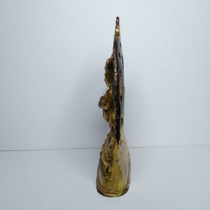 TIBET, 20th century 
Three gilded bronze...