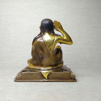 TIBET, 20th century 
Three gilded bronze...