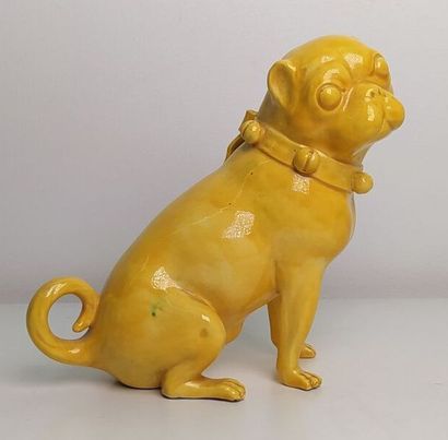 CHINA
Yellow glazed ceramic figurine of a...