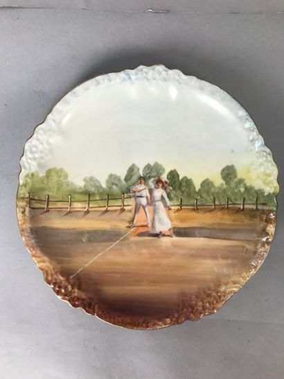 Three ceramic plates decorated with tennis...