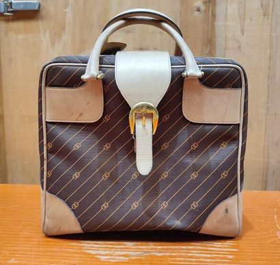 GUCCI
Set of two suitcases in monogrammed...