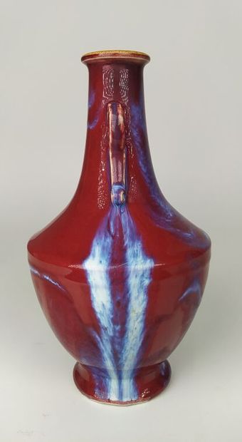 CHINA
Oxblood ceramic vase with handles 
Height...