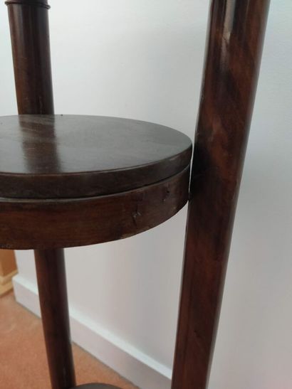 Mahogany veneered sellette, resting on three...