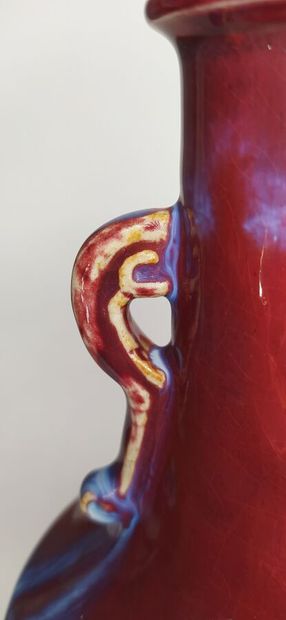 CHINA
Oxblood ceramic vase with handles 
Height...
