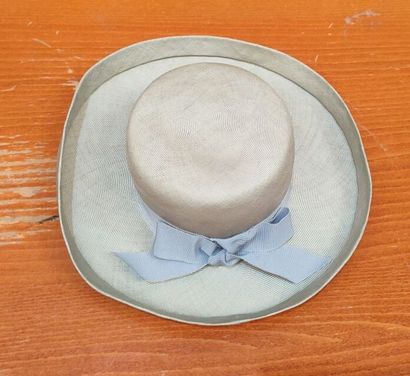 CARVEN
Set of two . hats, one navy blue and...