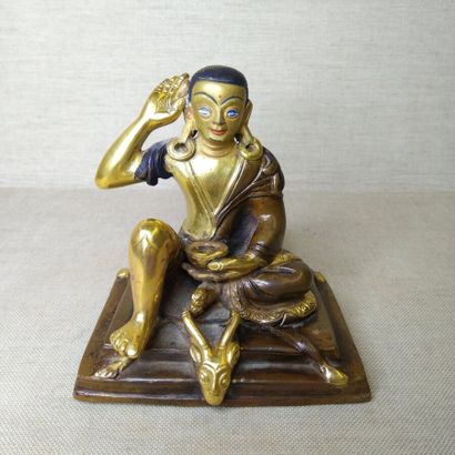 TIBET, 20th century 
Three gilded bronze...