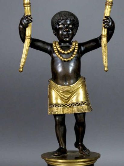 Paire de candélabres en bronze doré et patiné,...