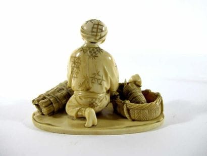 JAPON
Okimono en ivoire, représentant un...