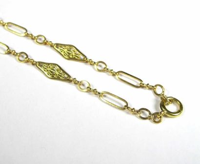 Sautoir articulé en or jaune 18K ajouré,...