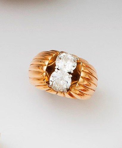 Bague en or jaune 18K à décor de godrons,...