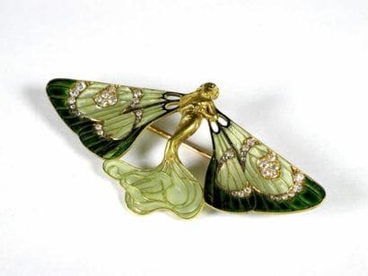 LALIQUE
Broche en or jaune 18K figurant une...
