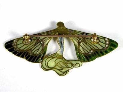 LALIQUE
Broche en or jaune 18K figurant une...
