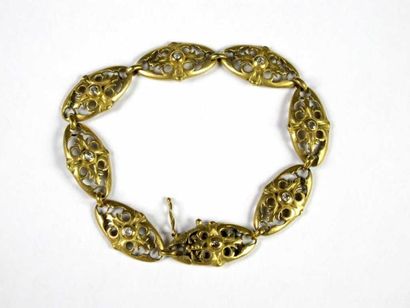 Bracelet articulé en or jaune 18K ajouré,...