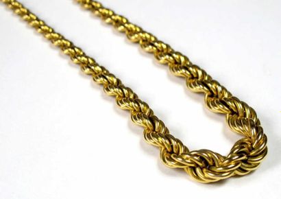 Collier souple en or jaune 18K, à décor de...