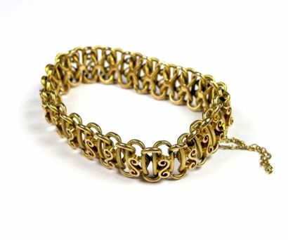 Bracelet articulé en or jaune 18K ajouré,...