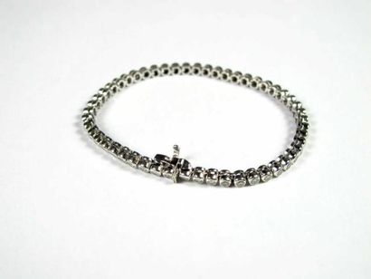 Bracelet souple en or gris 18K, orné d'une...
