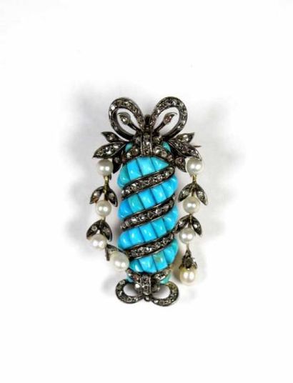 Broche pouvant former pendentif en or gris...