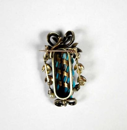 Broche pouvant former pendentif en or gris...