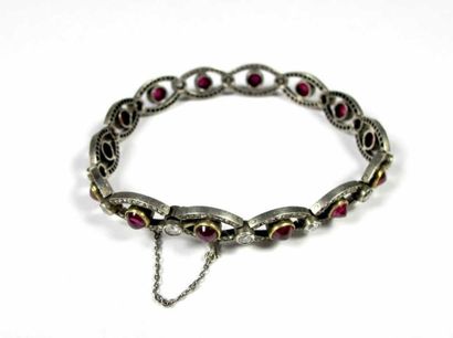 Bracelet articulé en or jaune 14K (585 millièmes)...