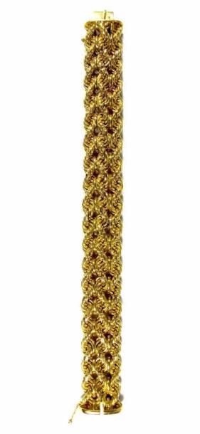 Bracelet souple en or jaune 18K, les maillons...
