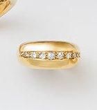 Large bague en or jaune 18K, ornée au centre...