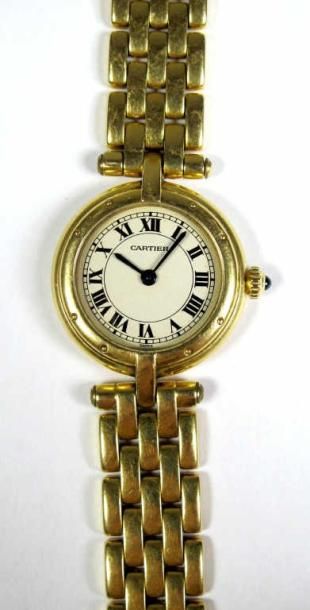 CARTIER
Montre-bracelet de dame en or jaune...