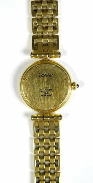 CARTIER
Montre-bracelet de dame en or jaune...