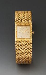 PIAGET
Montre-bracelet de dame en or jaune...