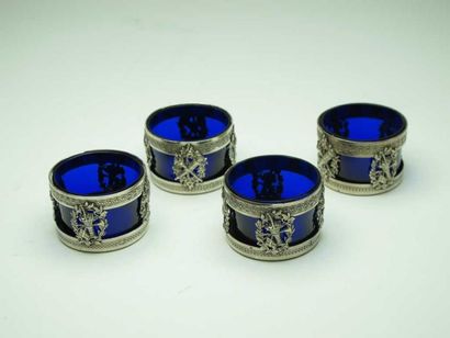 Quatre salières en argent ajouré, à décor...