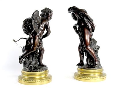 Paire de statuettes en bronze patiné représentant...