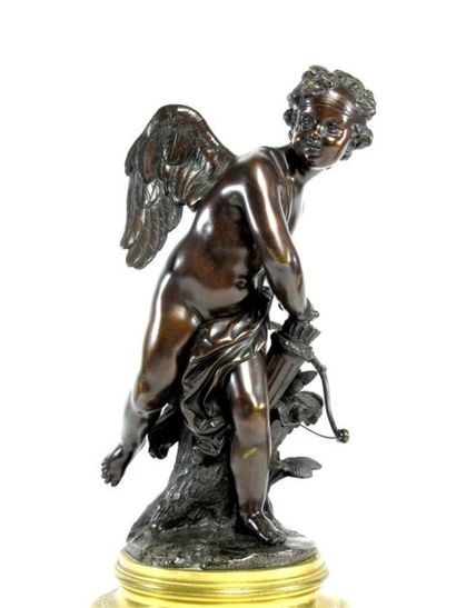 Paire de statuettes en bronze patiné représentant...