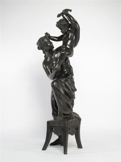 Statuette en bronze à patine foncée représentant,...