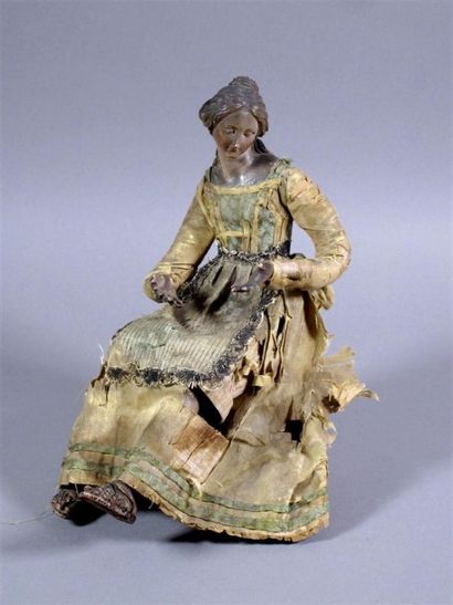 Santon napolitain figurant une femme assise,...