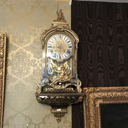Cartel en marqueterie d'ébène et de laiton.
Époque...